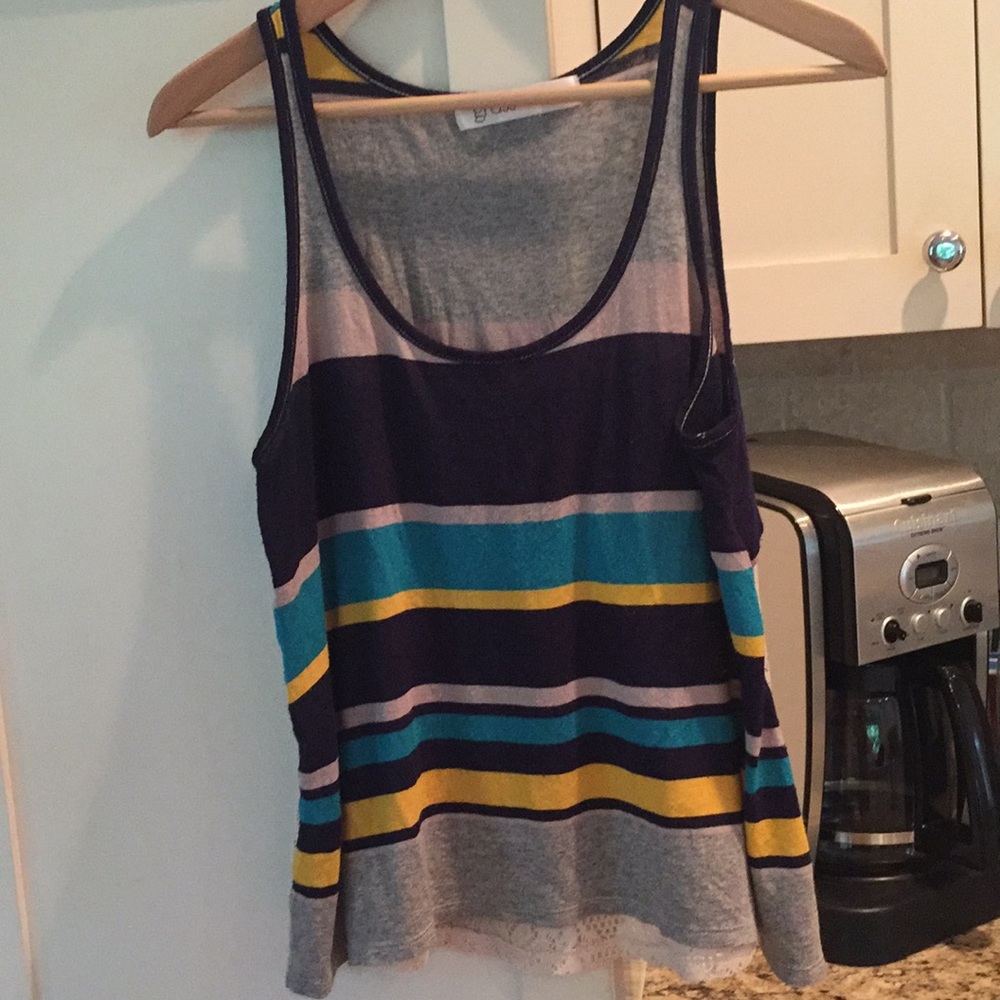 Striped flowy tank with sheer embroidered back.